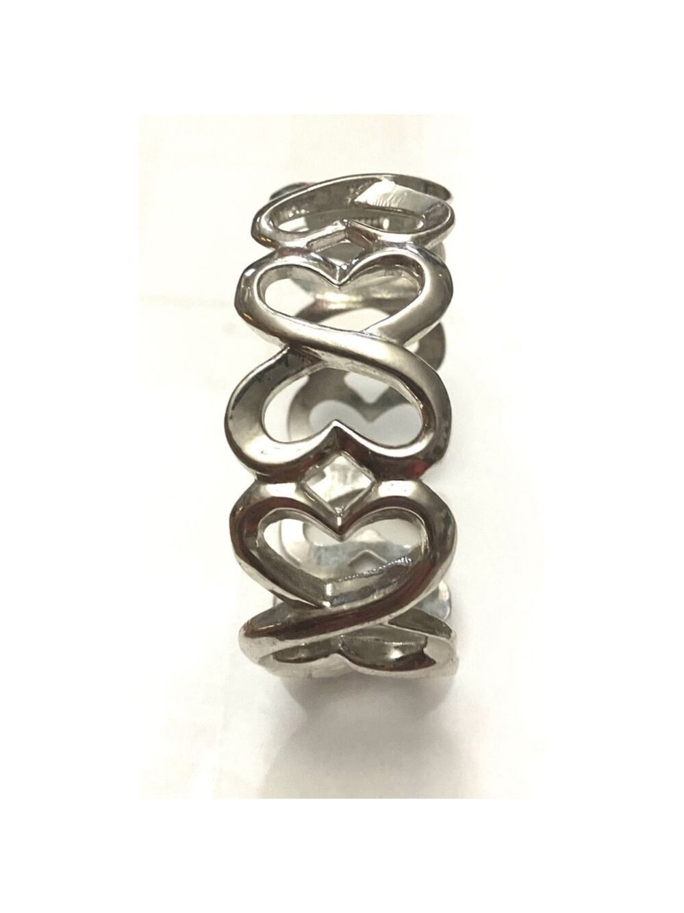 Silver toned Entwined Heart Bangle Bracelet One Size